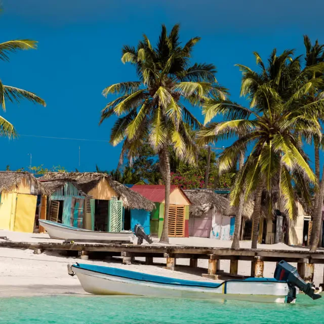 Close-up of a single painted wooden house in Mano Juan