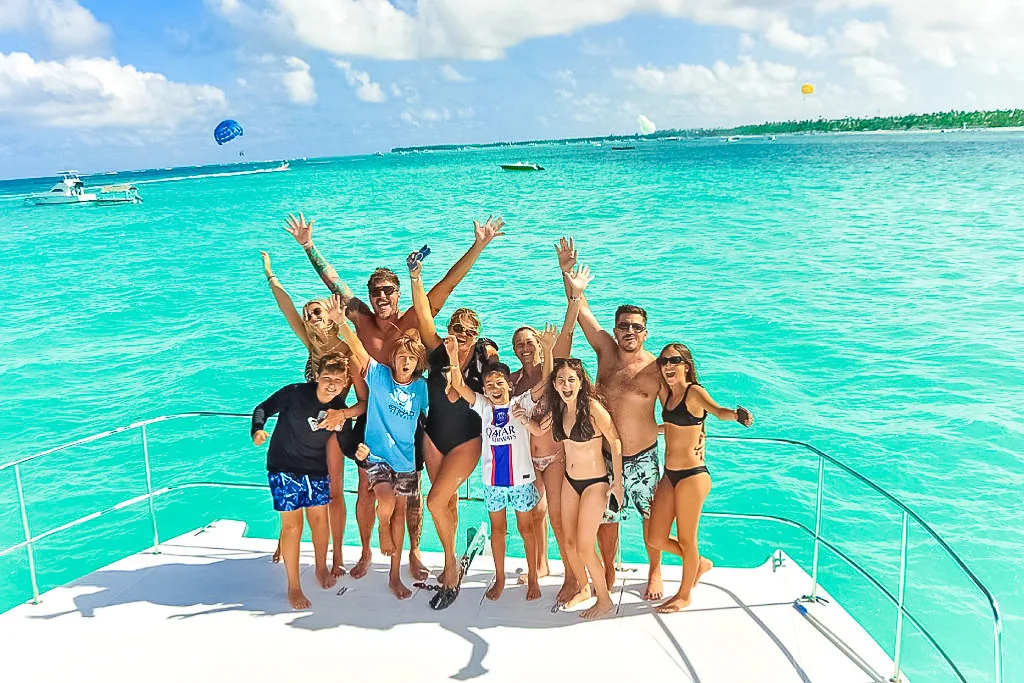 A family enjoying a private yacht charter to Saona Island