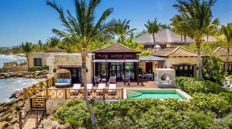 Aerial view of Cap Cana — gated community, golf courses, and oceanfront resorts